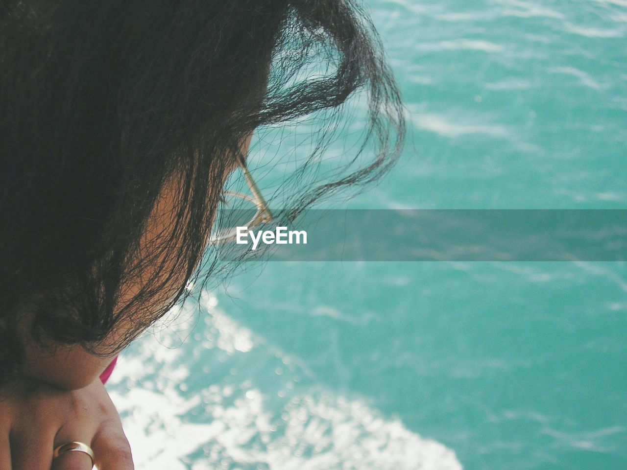 Close-up of woman looking at sea