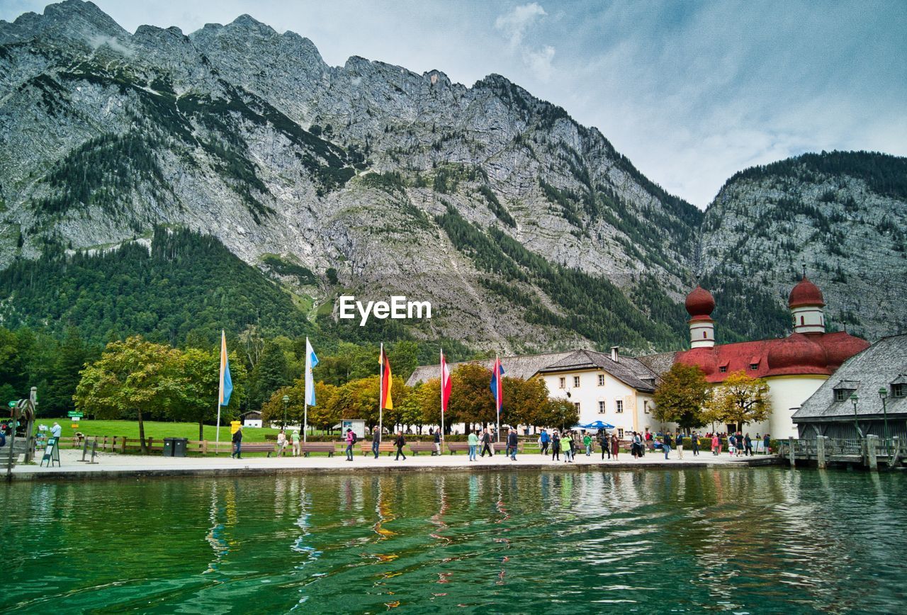 Scenic view of lake and mountains against sky