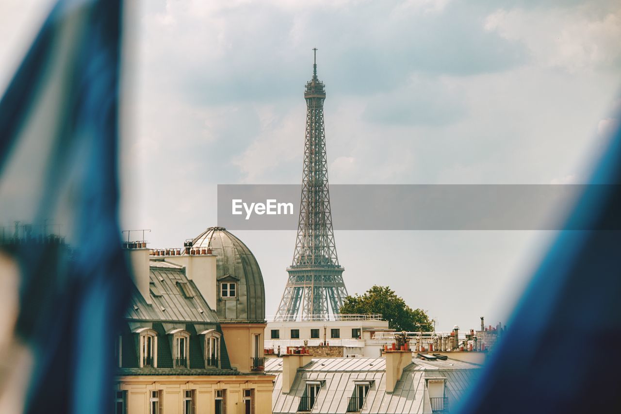 BUILDINGS IN CITY AGAINST SKY