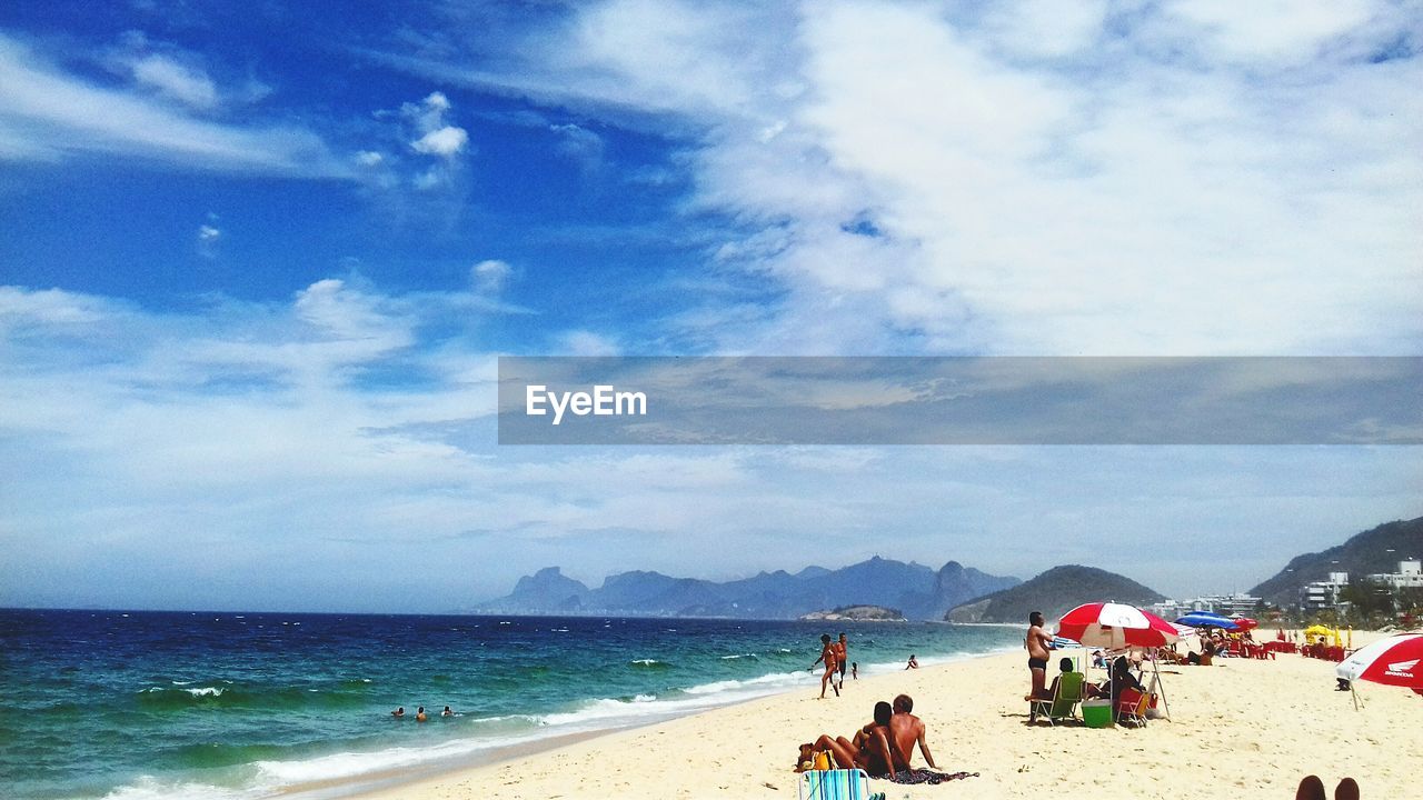 TOURISTS ON BEACH