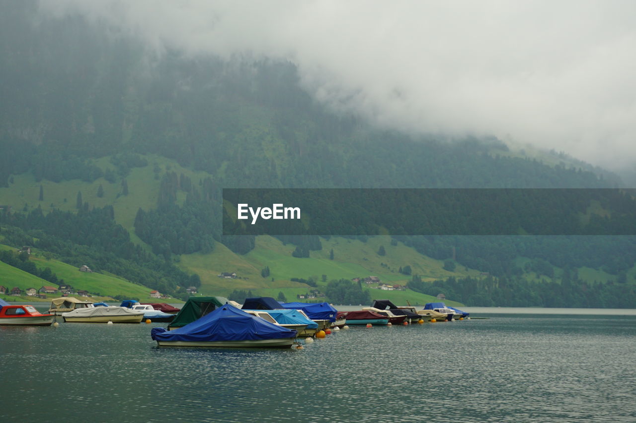 Scenic view of lake by mountains