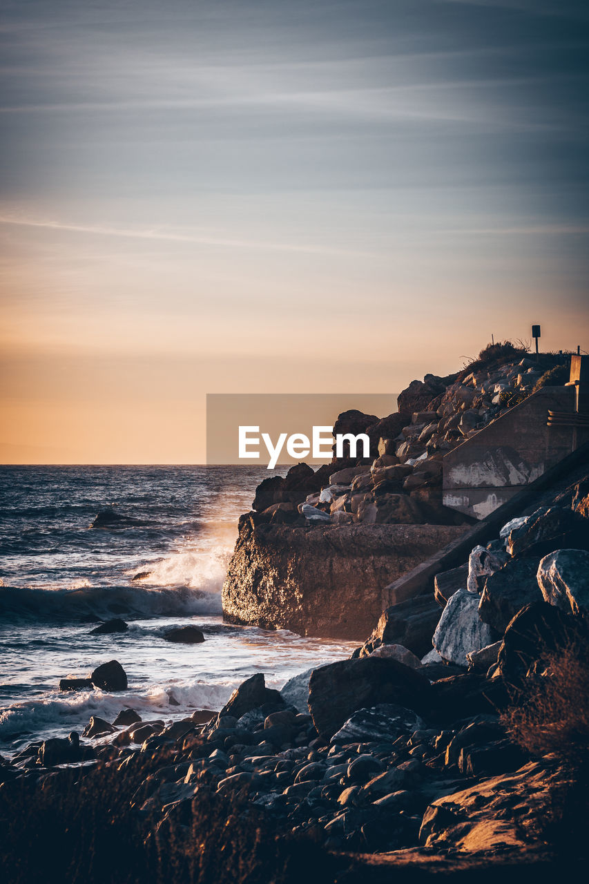 Scenic view of sea against sky during sunset