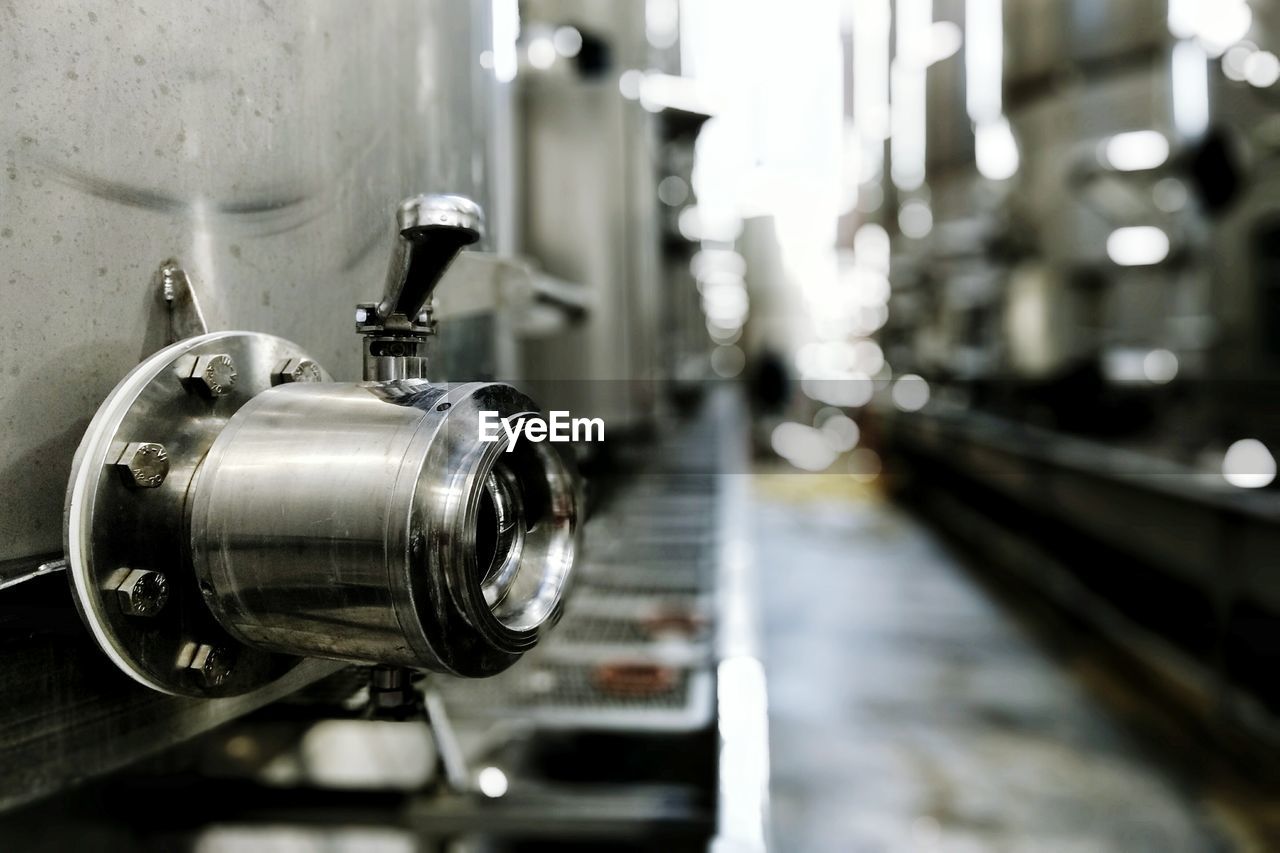 Close-up of faucet on storage tank