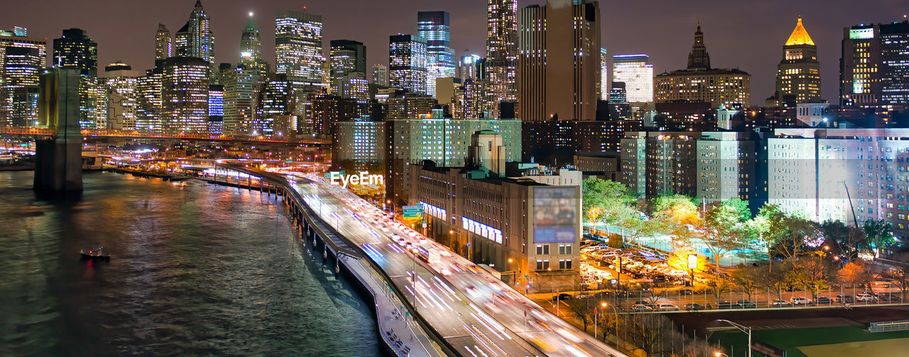 Illuminated buildings in city at night