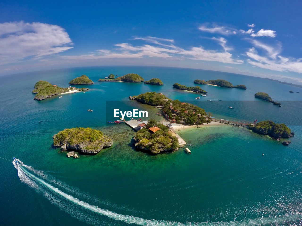 High angle view of bay and island against sky