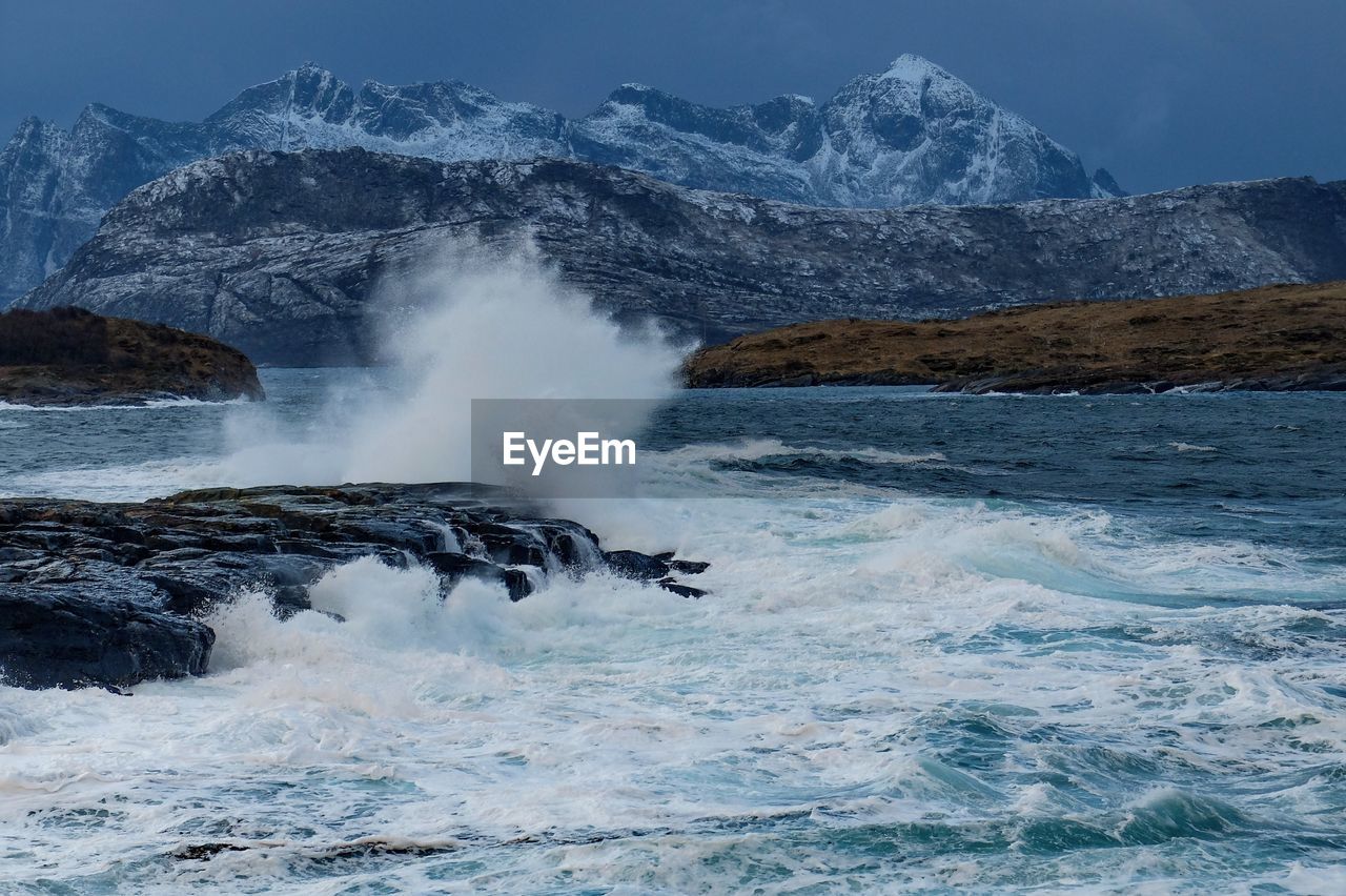 WATER SPLASHING ON ROCKS