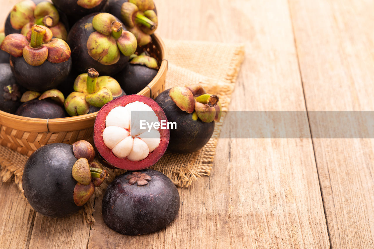 food and drink, food, healthy eating, freshness, wellbeing, fruit, wood, produce, no people, still life, plant, variation, table, studio shot, high angle view, indoors, organic, vegetable, nature, bowl, rustic, agriculture