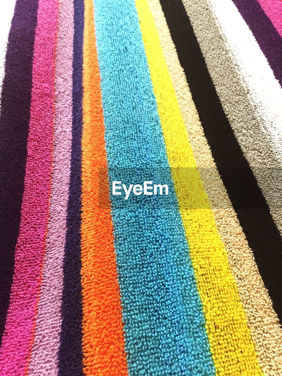 Full frame shot of multi colored stripes on carpet