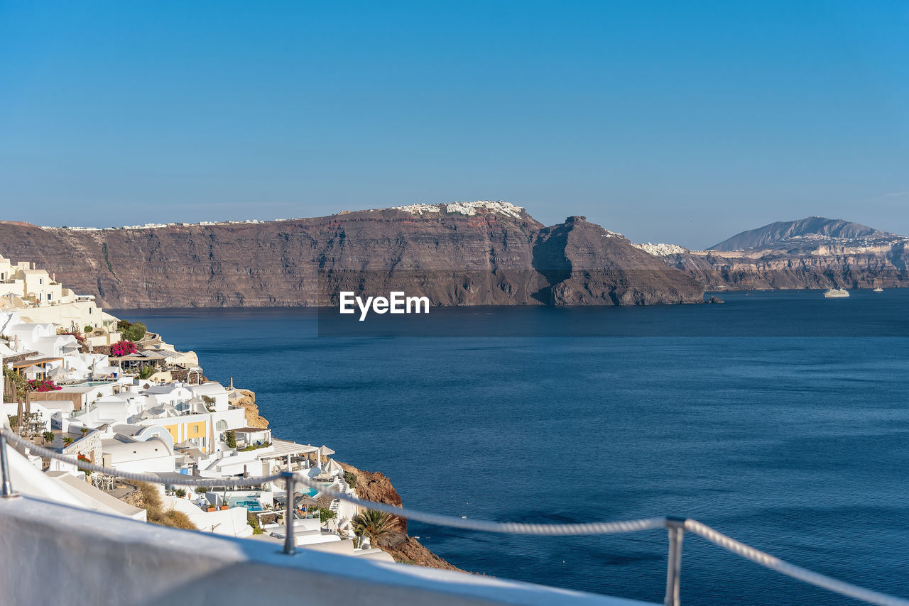 Scenic view of sea against clear blue sky