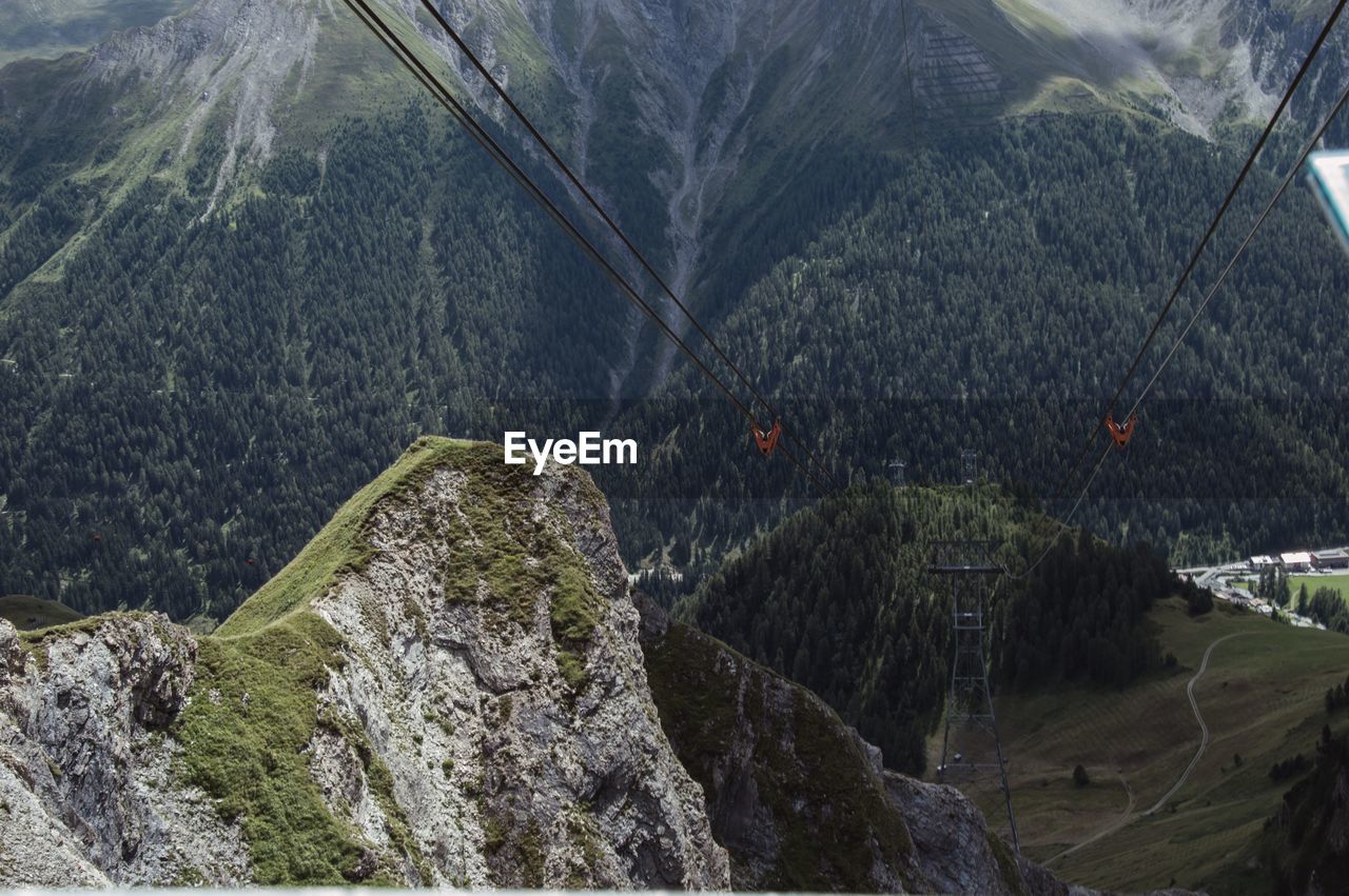High angle view of cables against mountains
