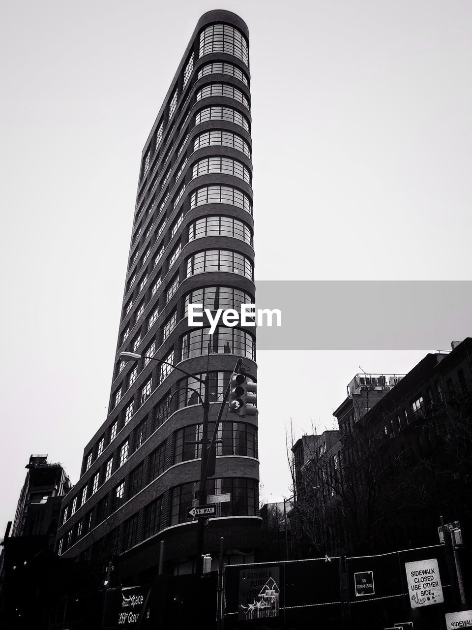 LOW ANGLE VIEW OF SKYSCRAPERS AGAINST CLEAR SKY