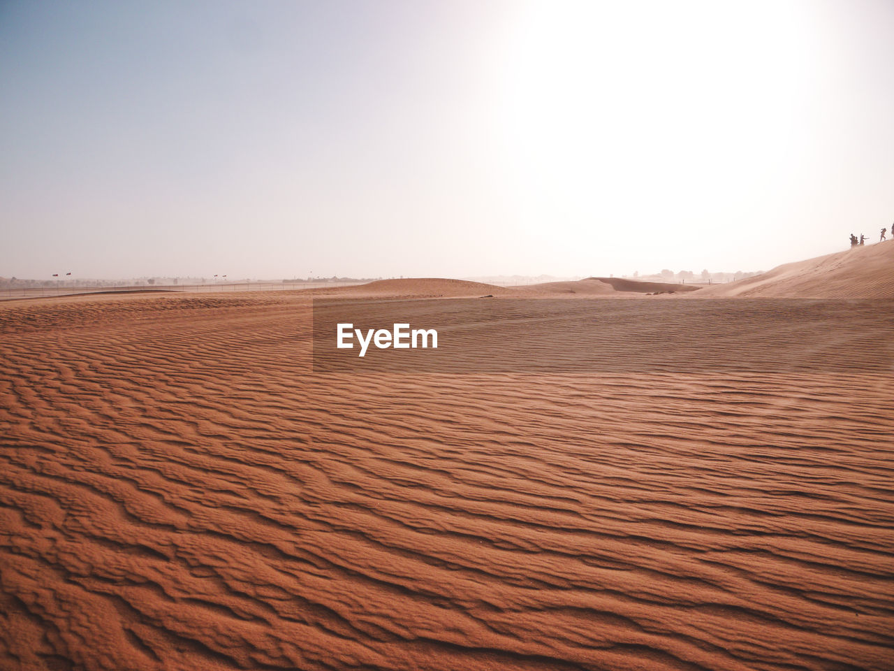 Scenic view of desert against clear sky