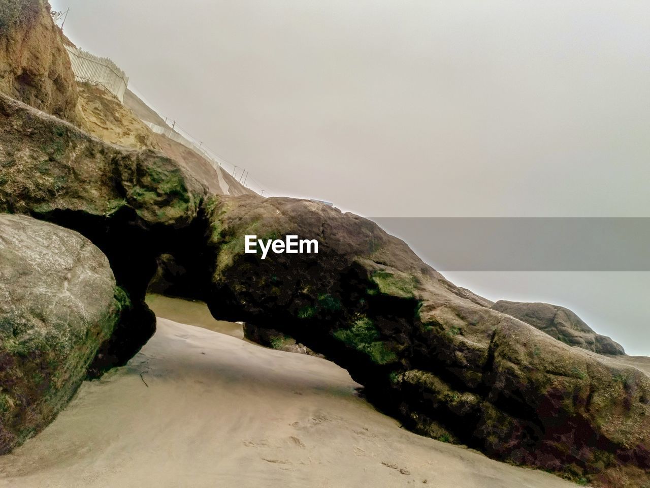 SCENIC VIEW OF ROCK FORMATIONS AGAINST SKY