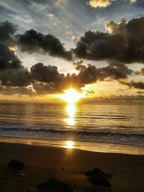 SCENIC VIEW OF SUNSET OVER SEA