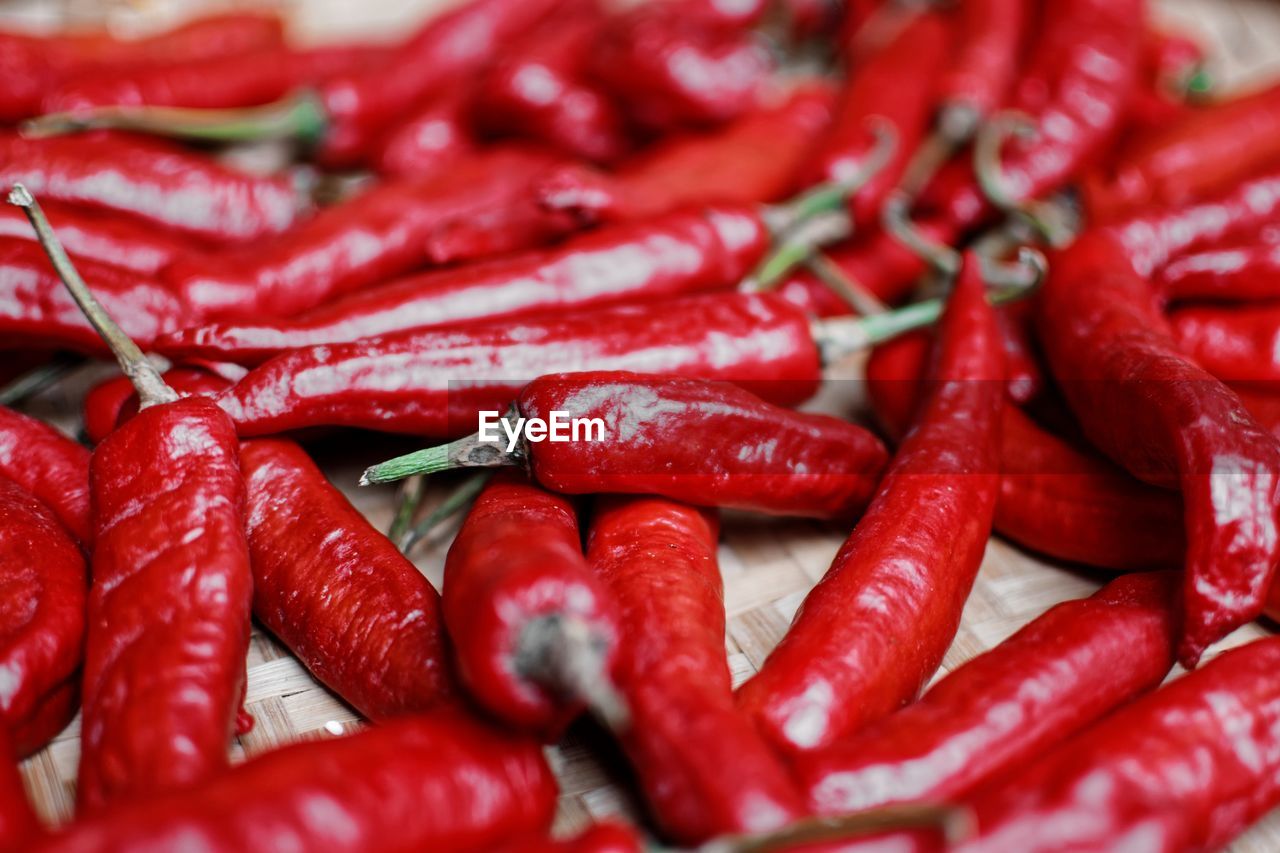 Full frame shot of red chili peppers for sale in market