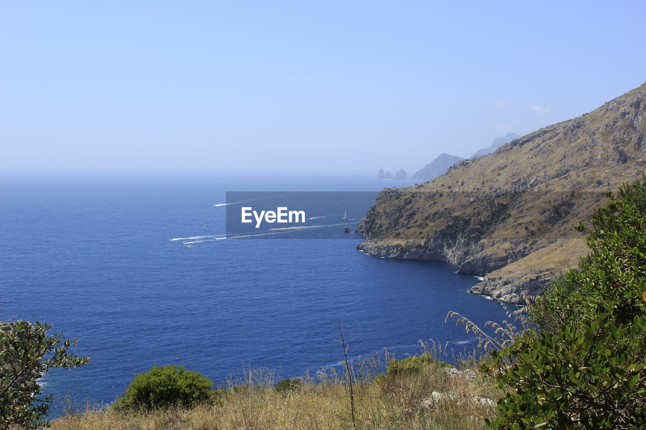 Scenic view of sea against clear sky