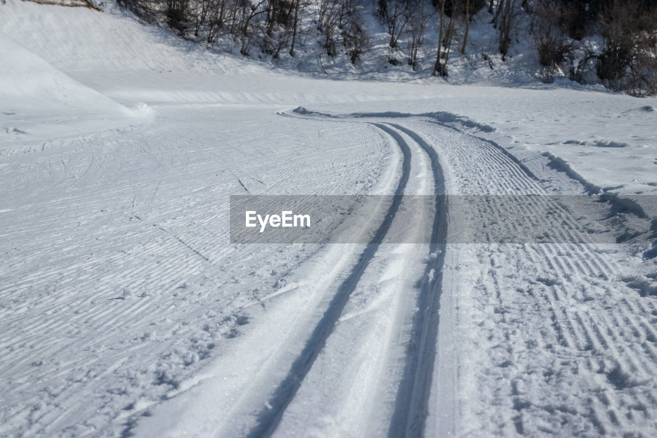 Tire tracks in snow