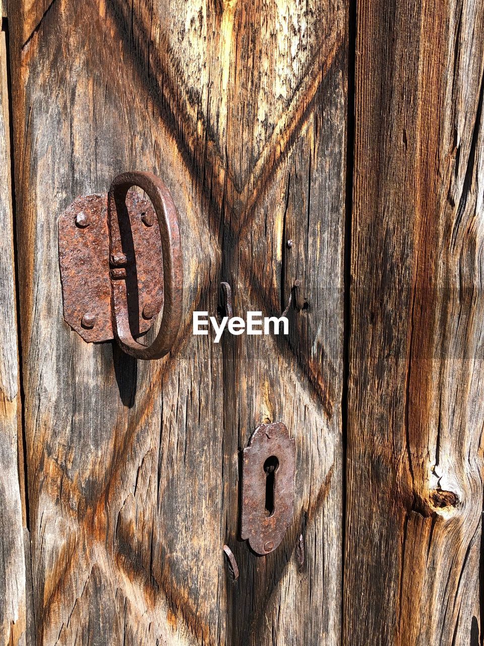 CLOSE-UP OF WEATHERED DOOR