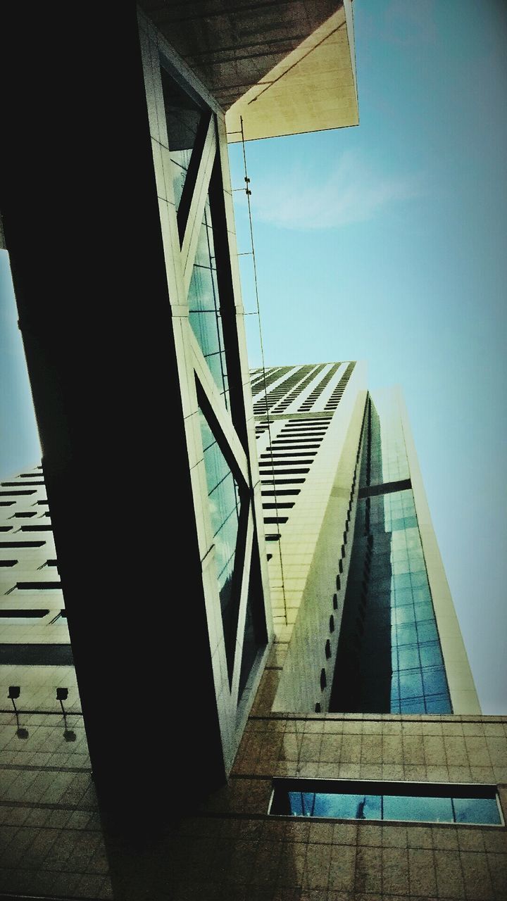 LOW ANGLE VIEW OF MODERN BUILDINGS