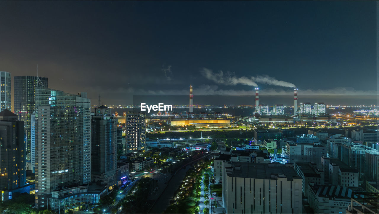 high angle view of city lit up at night