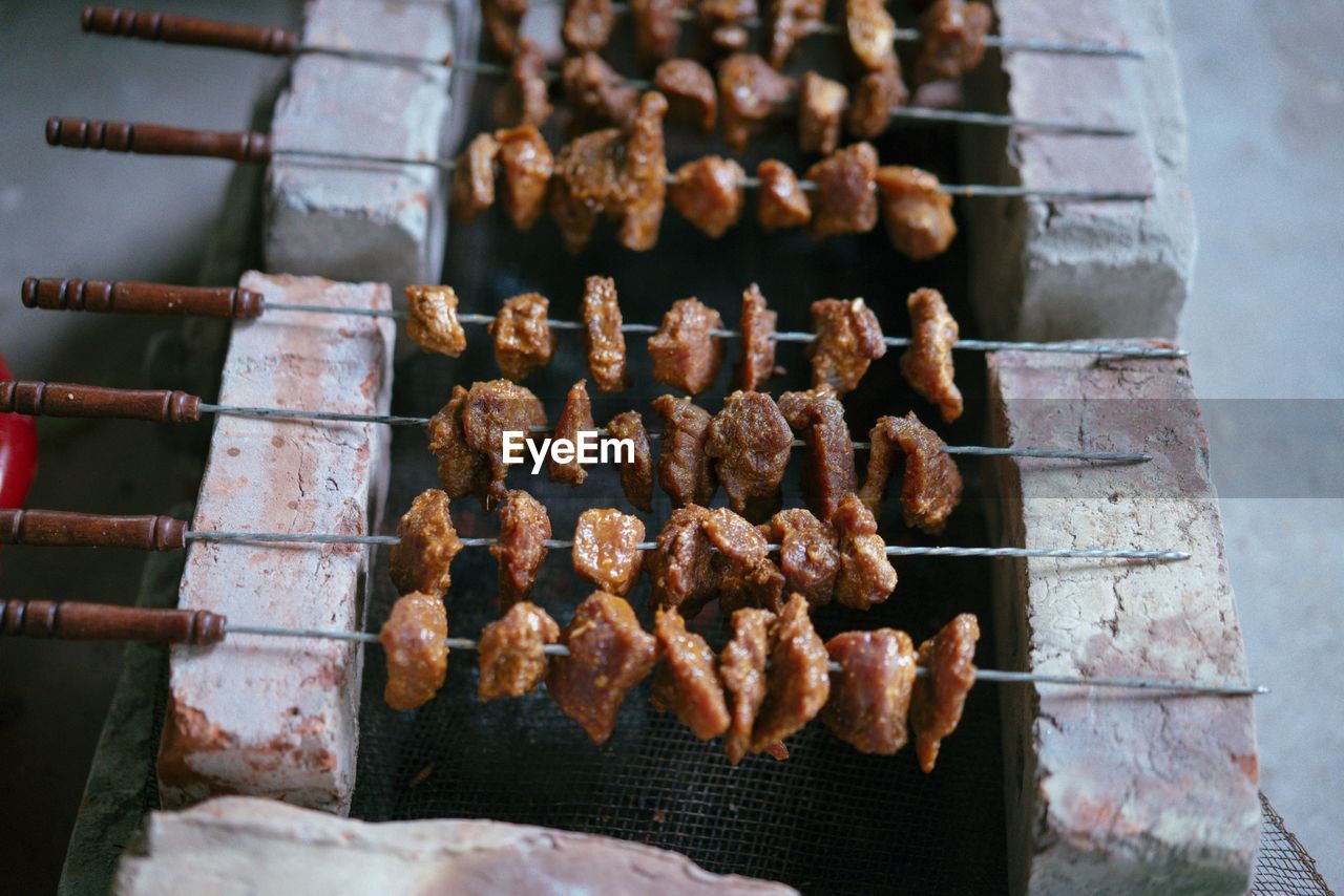 Close-up of meat on barbecue grill