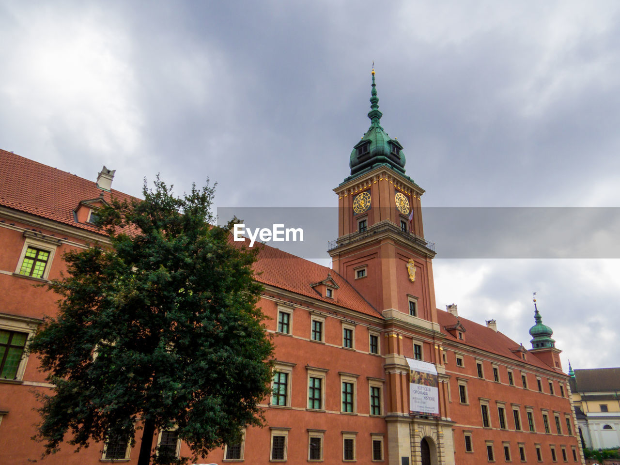 architecture, building exterior, built structure, building, landmark, sky, city, tower, cloud, travel destinations, town, nature, tree, downtown, the past, history, clock tower, urban area, plant, travel, clock, cityscape, time, no people, tourism, low angle view, town square, seat of local government, residential district, facade, outdoors, neighbourhood, château, place of worship, day, government, old