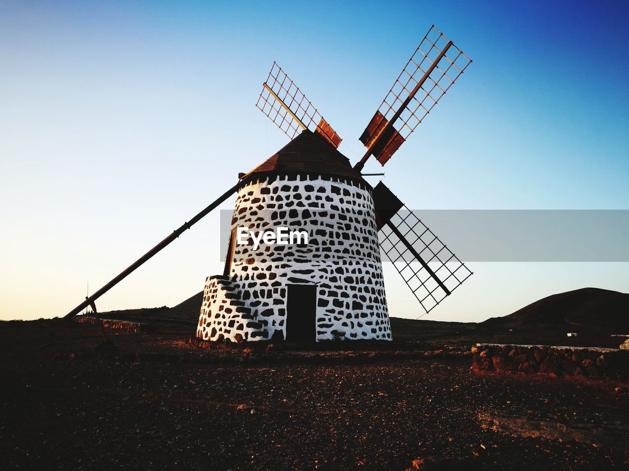 TRADITIONAL WINDMILL AGAINST SKY