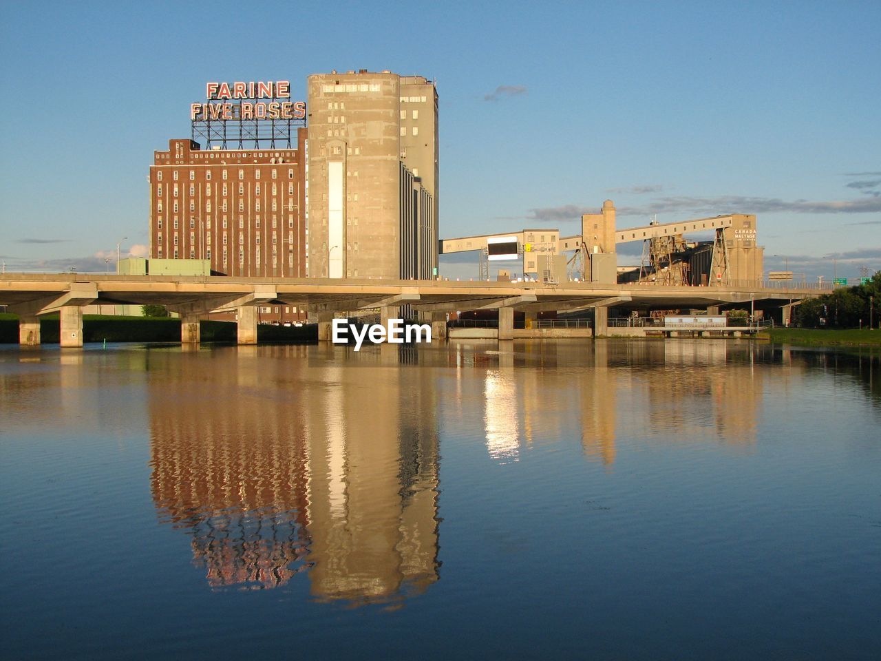 REFLECTION OF BUILDINGS IN WATER