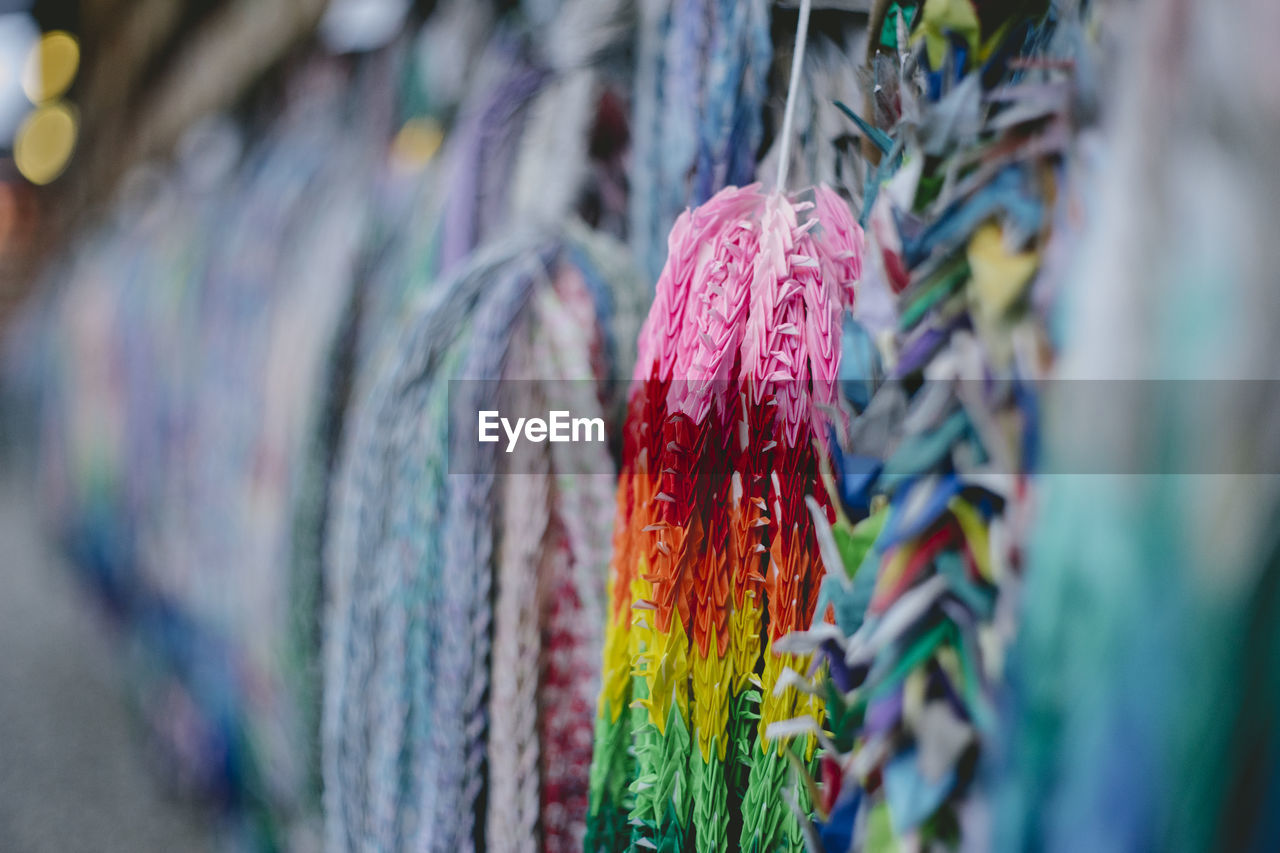 Colorful decoration hanging at market for sale