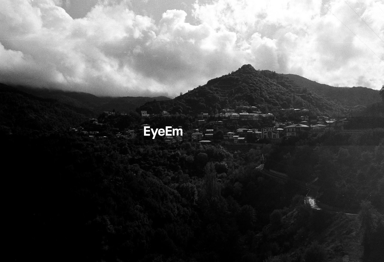 SCENIC VIEW OF MOUNTAIN AGAINST SKY