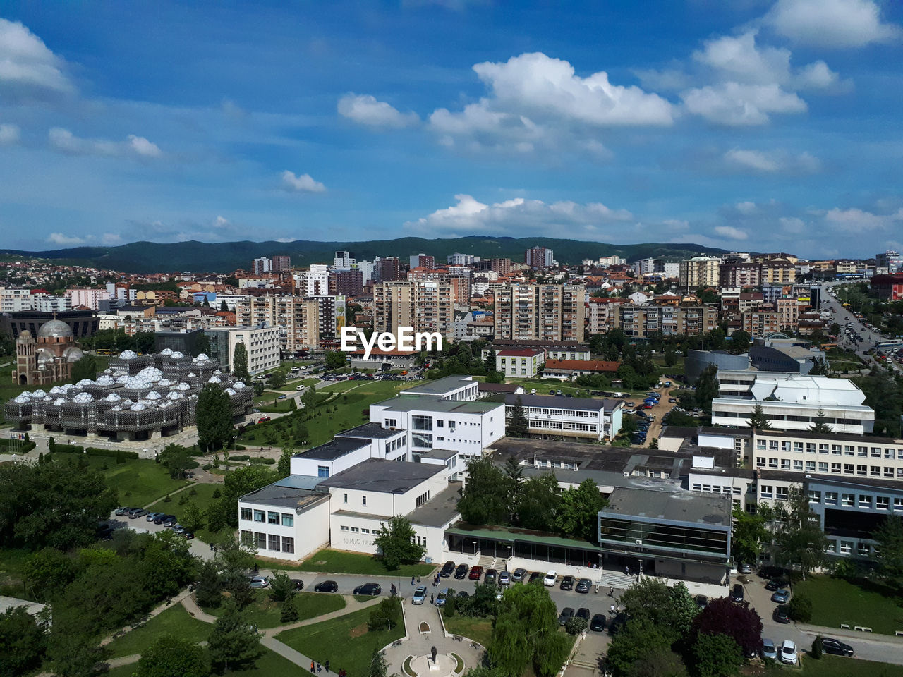 High angle view of buildings in city against sky