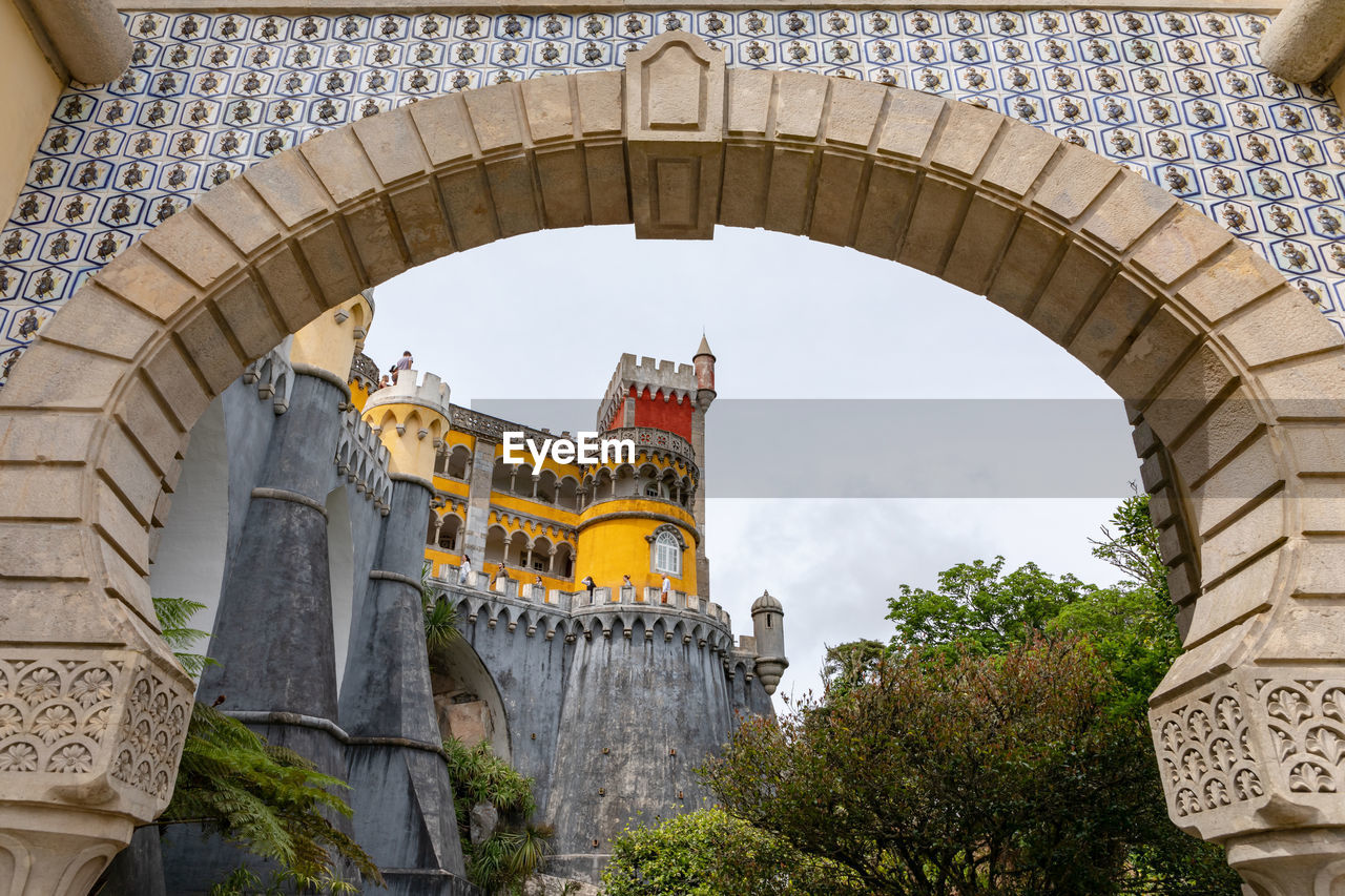 An archway at the entrance of the pena national palace, sintra, portugal