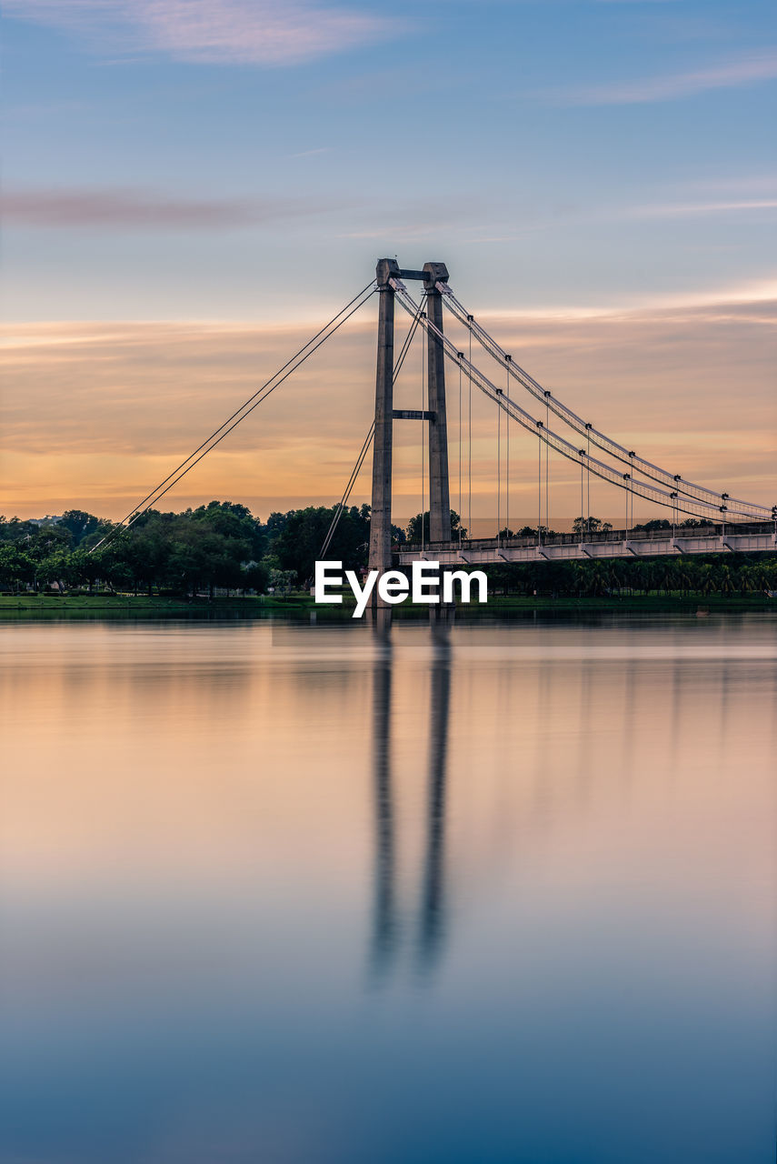 VIEW OF BRIDGE OVER RIVER AGAINST SKY