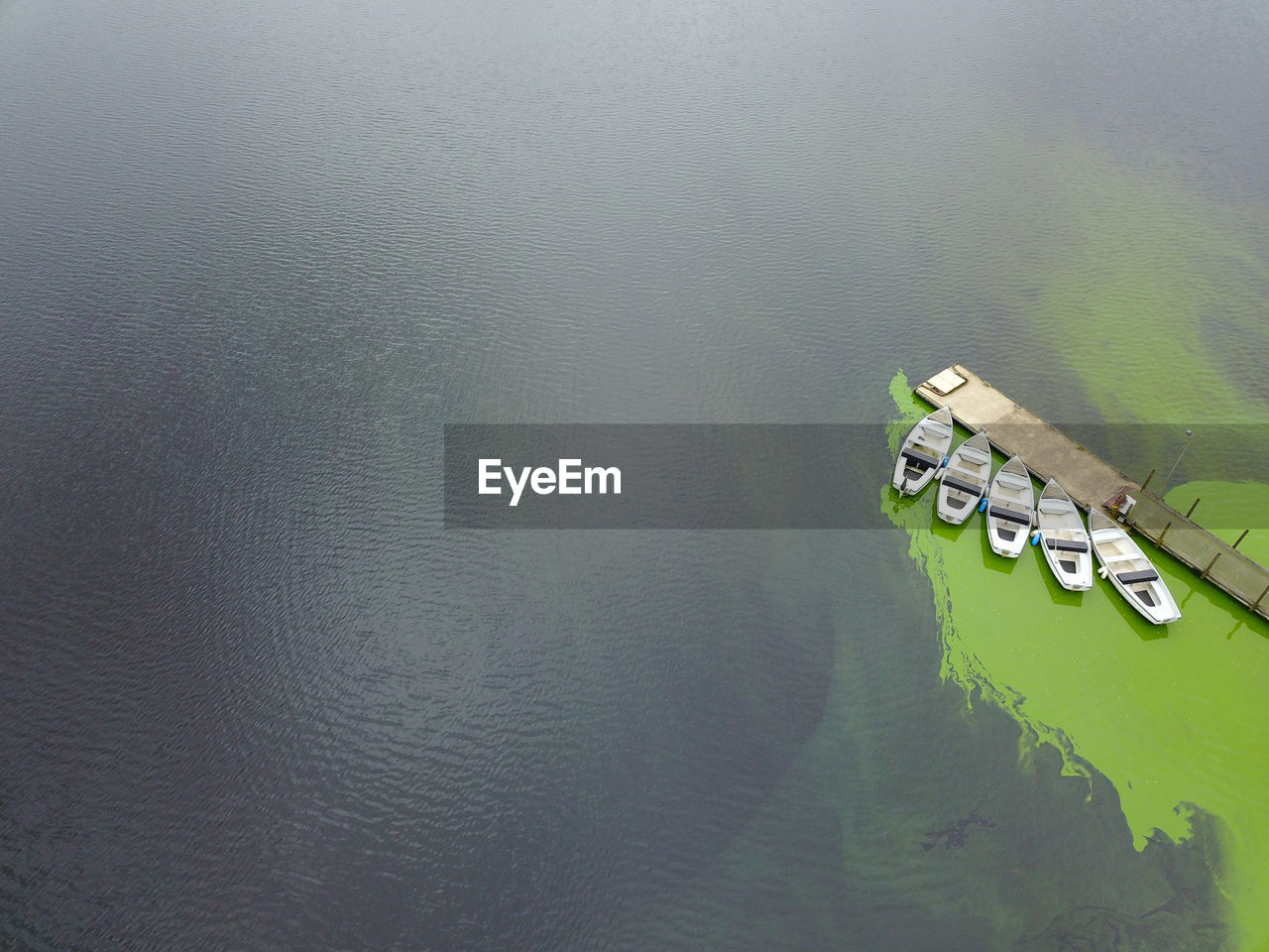 HIGH ANGLE VIEW OF SHIP IN LAKE