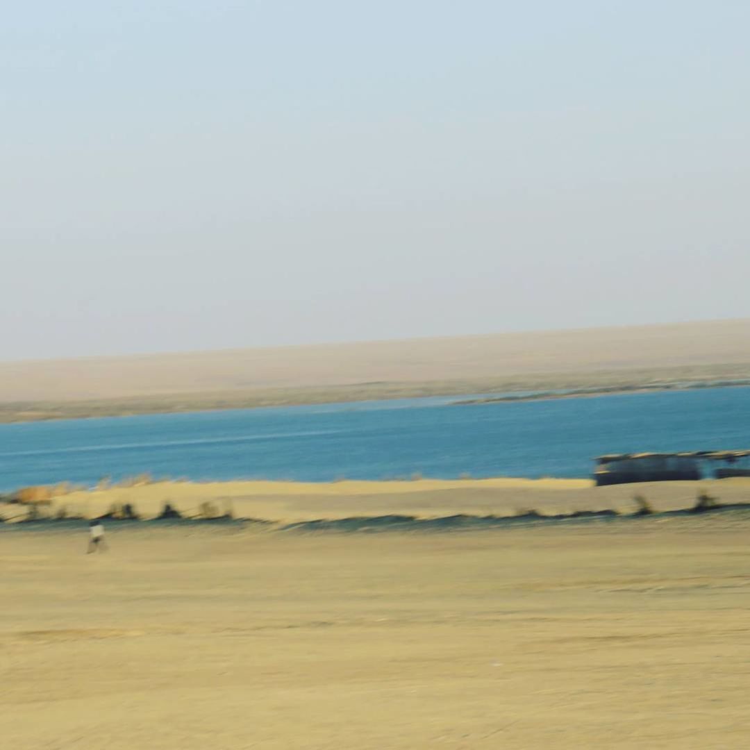 VIEW OF BEACH AGAINST SKY