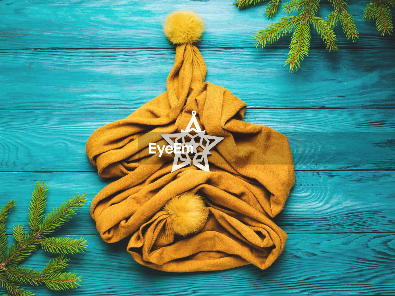 Christmas winter flat lay with yellow scarf tree