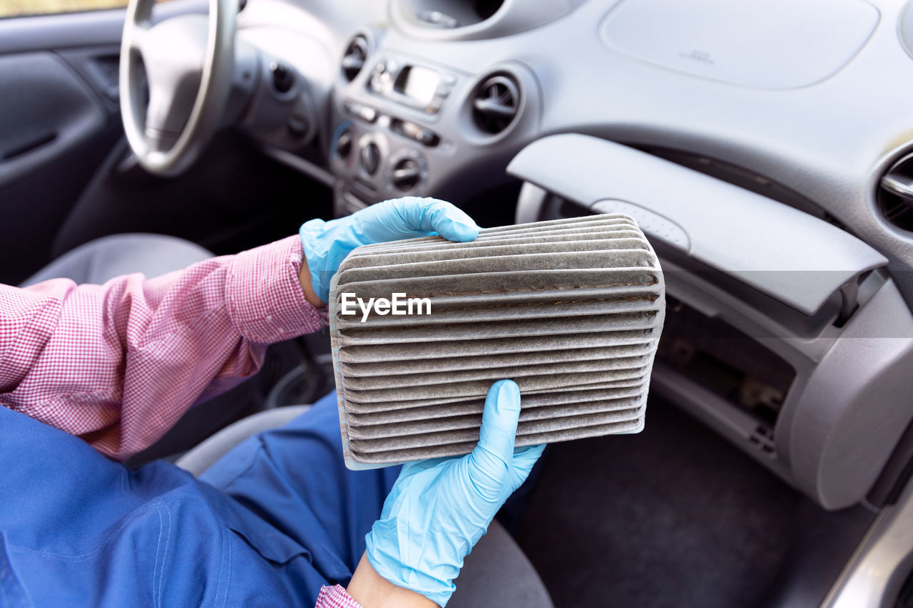Replacement of dirty cabin pollen air filter for a car