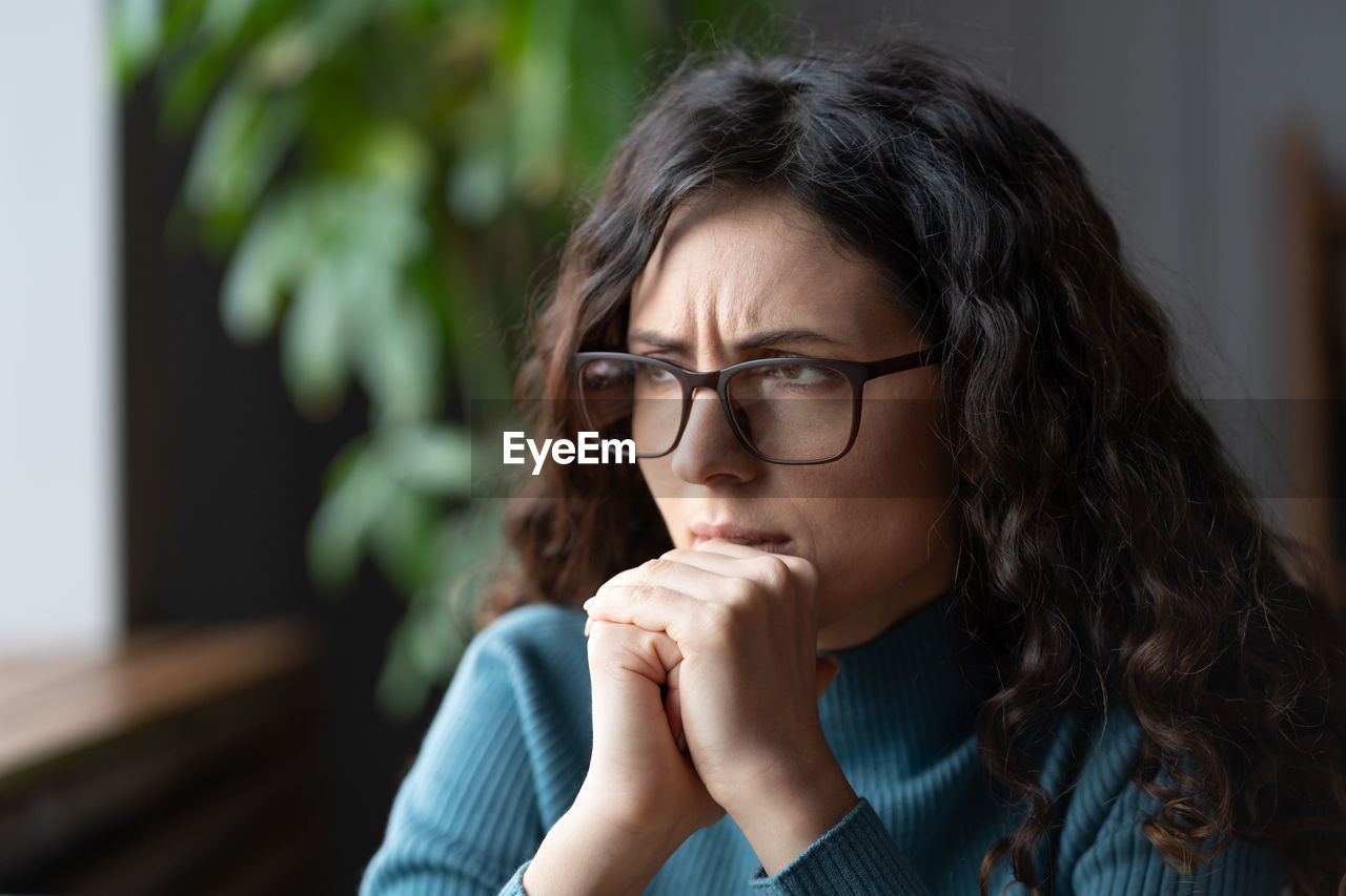 Nervous anxious business woman wait for job interview or exam result, try to solve problem at work