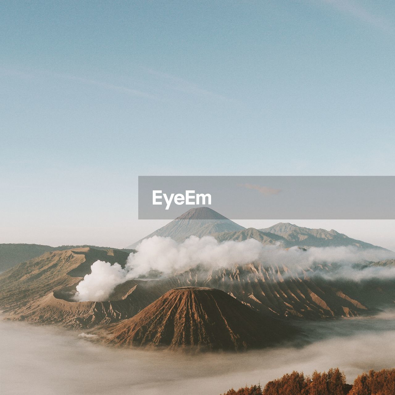 Scenic view of volcanic mountains against sky