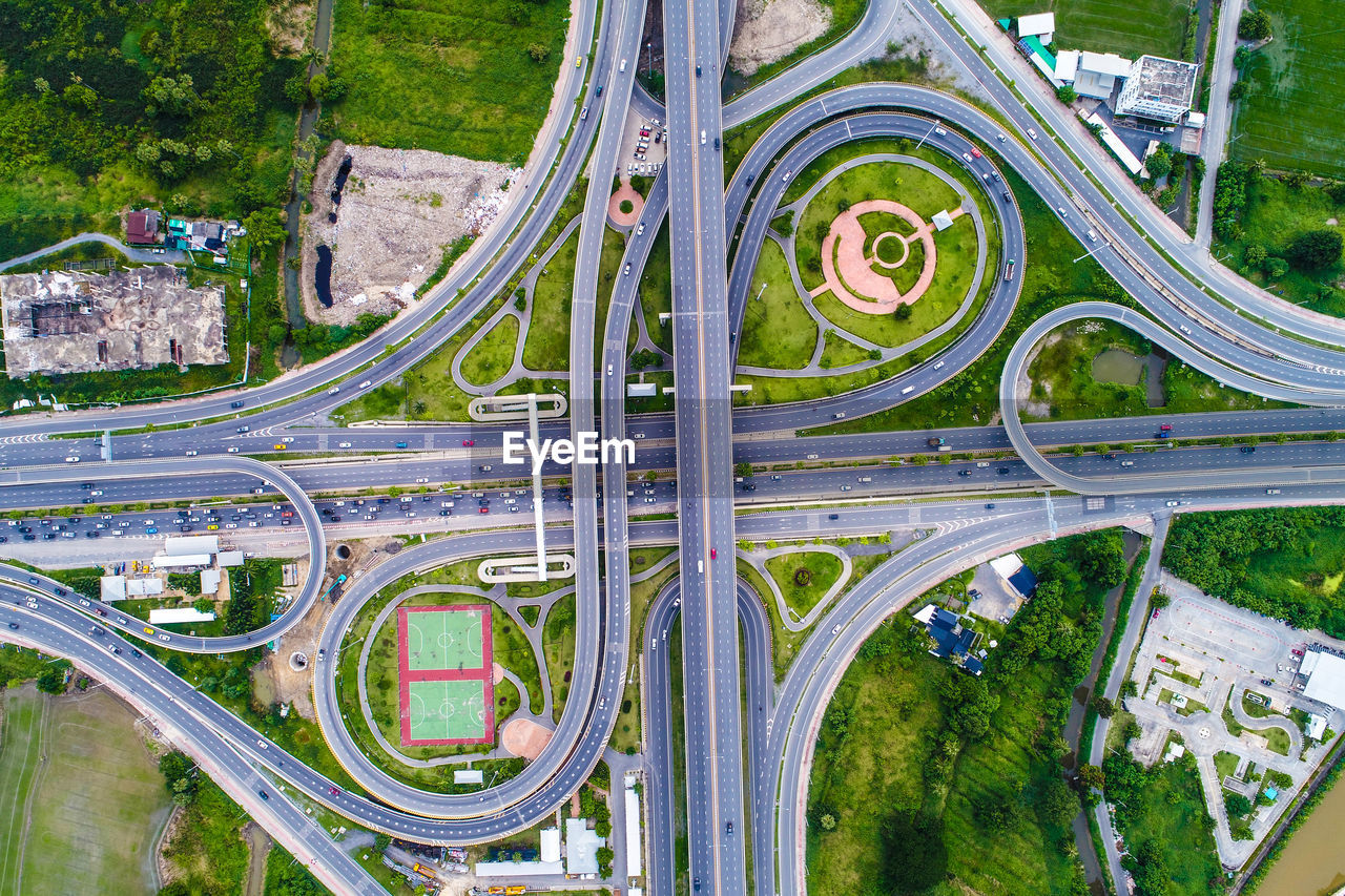 HIGH ANGLE VIEW OF BRIDGE OVER CITY