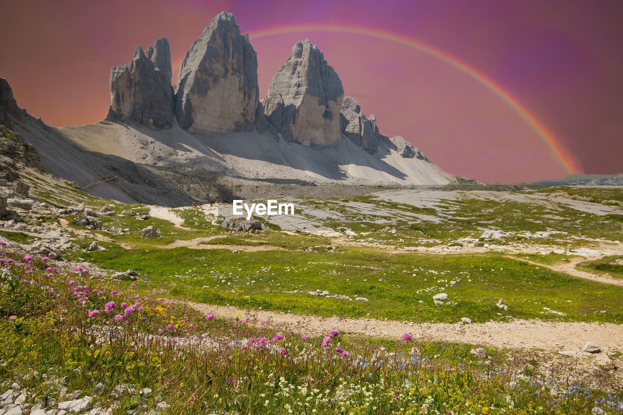 View of tre cime di laveredo with rianbow, three spectacular mountain peaks in tre cime di lavaredo