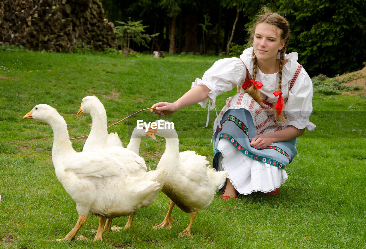 Girl with geese