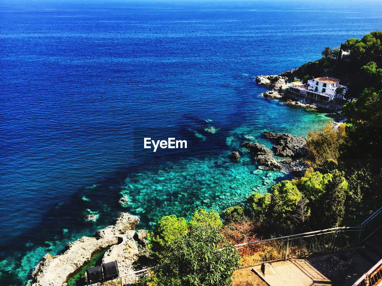 High angle view of house by sea 