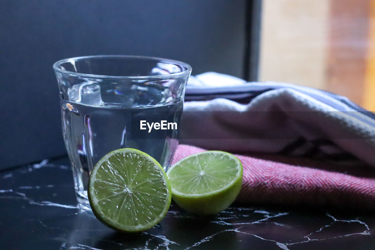 CLOSE-UP OF DRINK IN GLASS