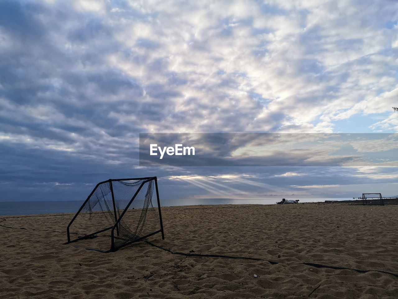 SCENIC VIEW OF SANDY BEACH AGAINST SKY