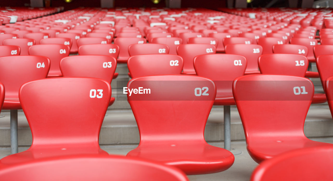 Empty red seats in stadium