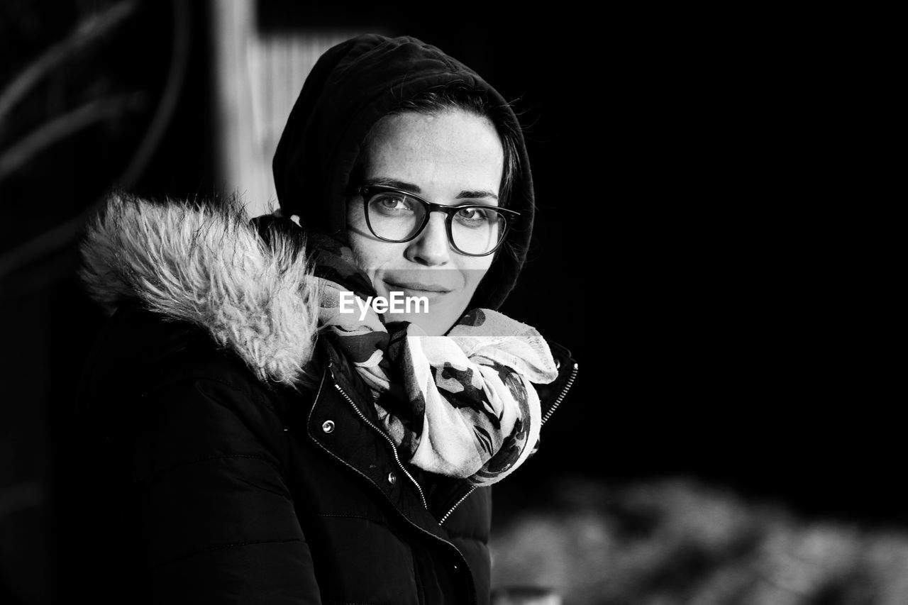 Portrait of woman wearing eyeglasses during winter