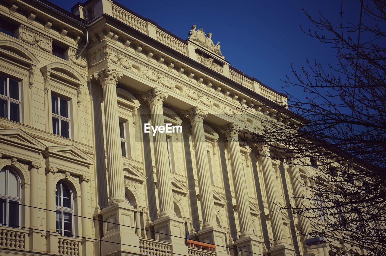 Low angle view of historic building against sky