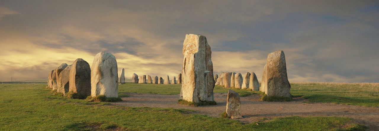 Standing rocks on landscape against the sky