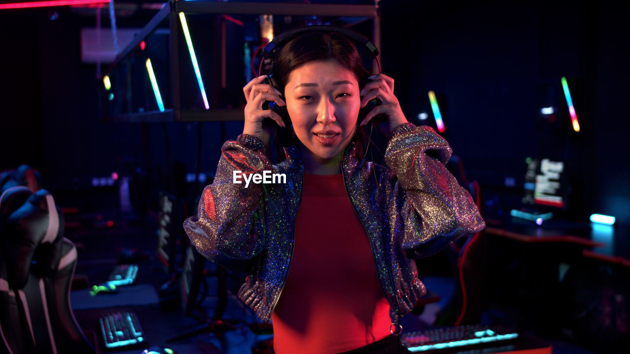 Portrait of woman at internet cafe